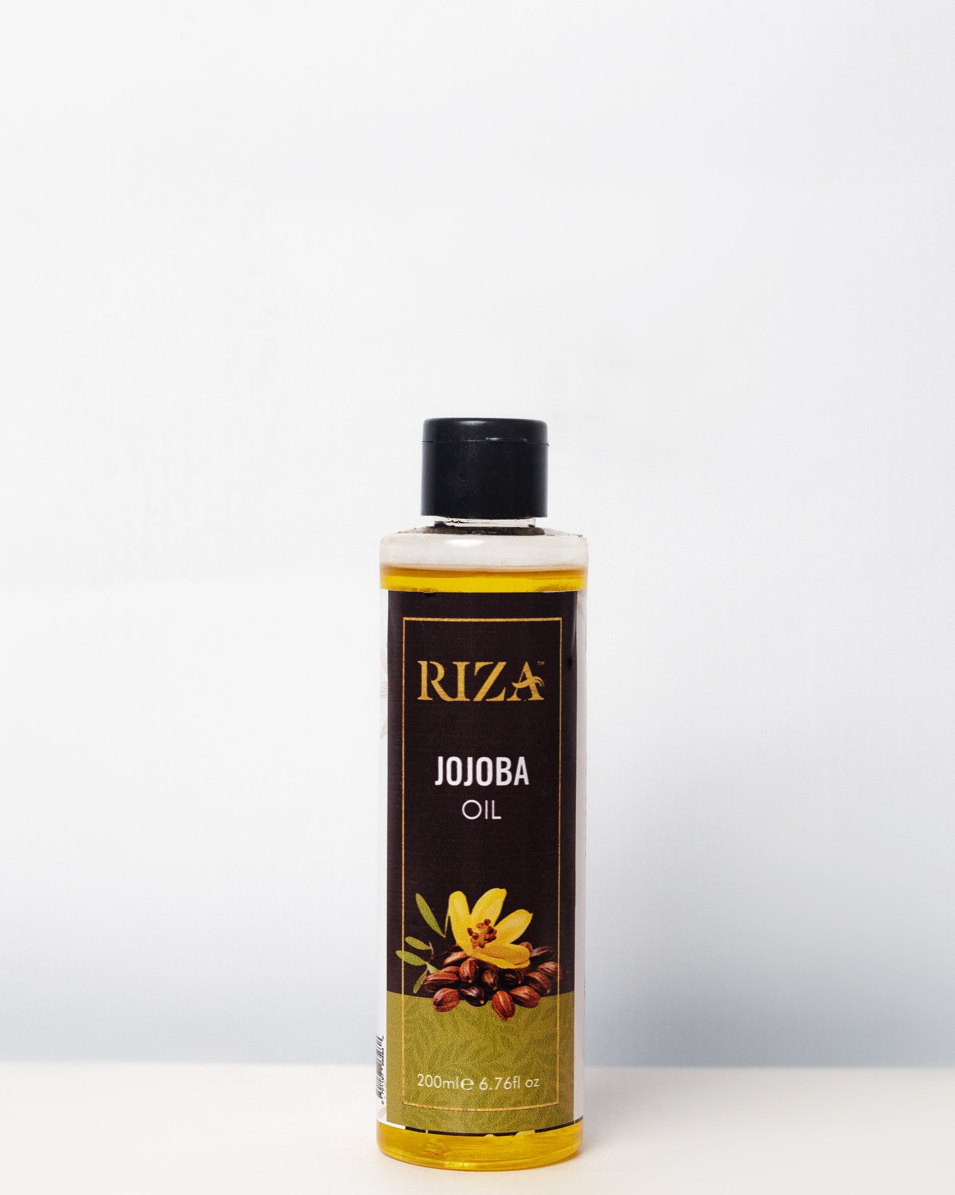 Riza Jojoba Oil – pure natural oil for balanced skin, hair care and deep hydration.
