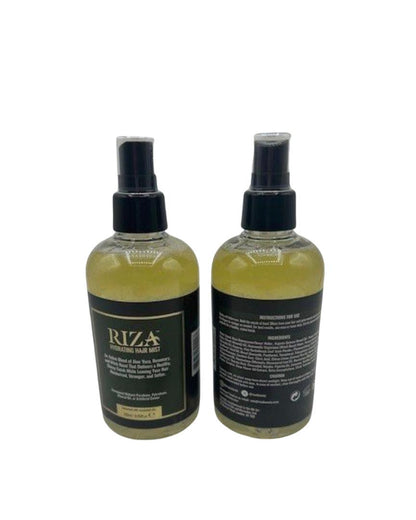 Two bottles of Riza hair mist on a white background